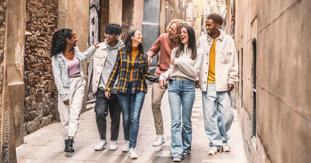 Friends walking together on a city street